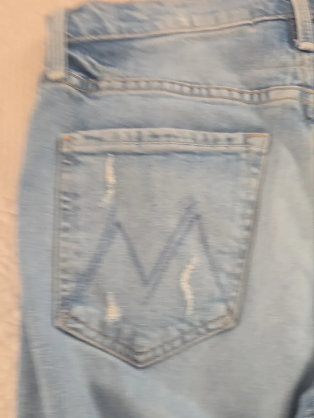 MOTHER The Tomcat Light Blue Distressed Women’s Jeans